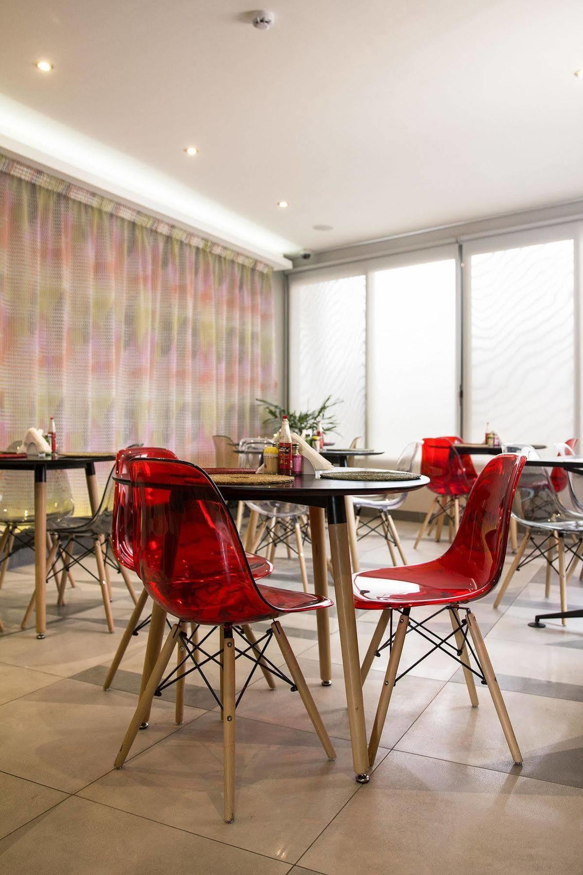 Urbano Hotel By Roots Wiaboman Exterior photo